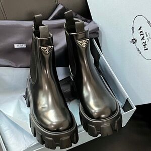 Prada Black Patent Lug-Sole Chelsea Booties